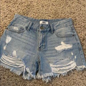 Ripped distressed jean shorts (just black denim)